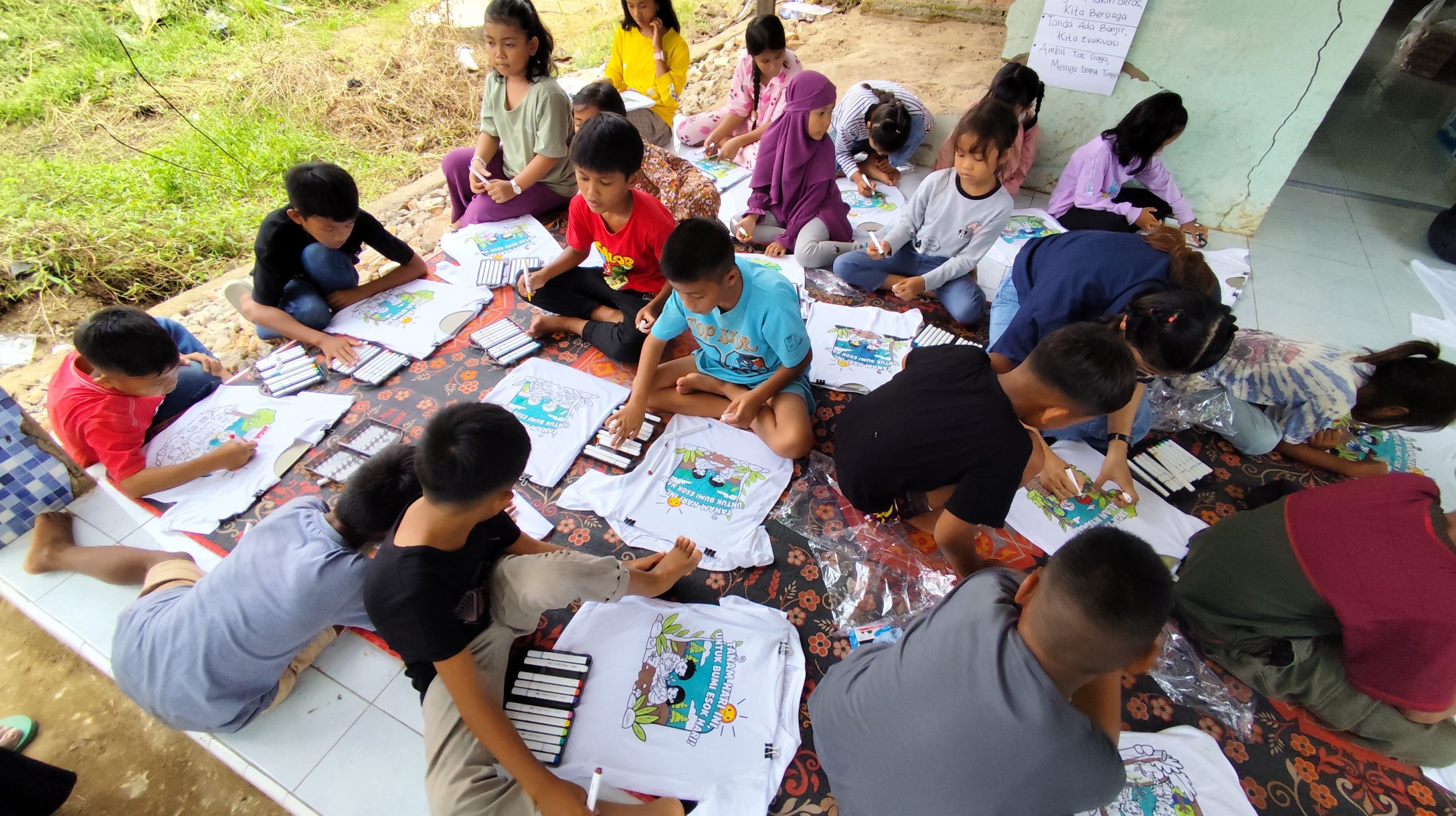 Workshop Ilustrasi dan Storytelling Visual sebagai Media Trauma Healing Anak Terdampak Banjir Bandang di Kelurahan Koto Panjang Ikua Koto