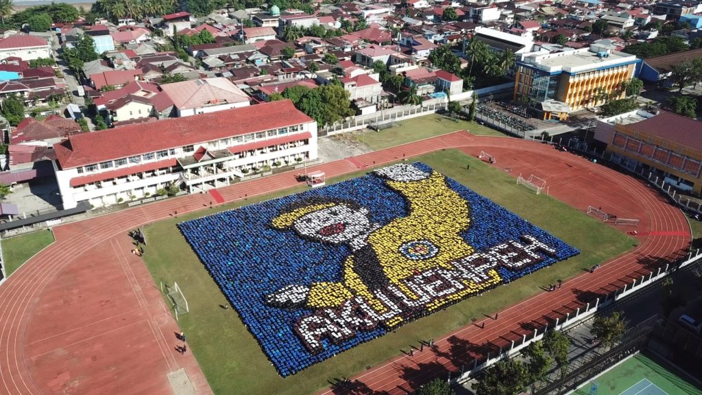 Salah satu formasi papermob Mahasiswa Baru UNP 2026. (Foto: Drone Ridho Prima/Kantor Komunikasi dan Pemasaran Strategis)